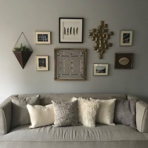 grey sofa with pillows